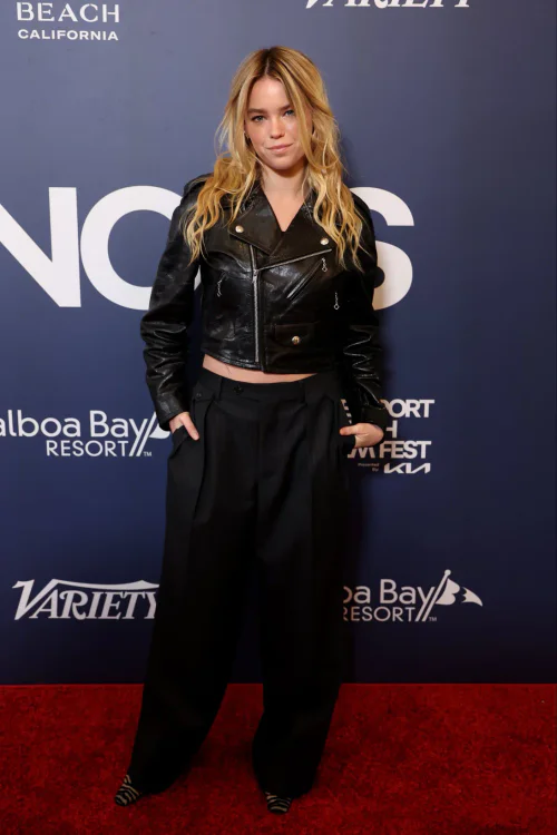 Edgy Chic in Black Leather Jacket and High-Waisted Trousers