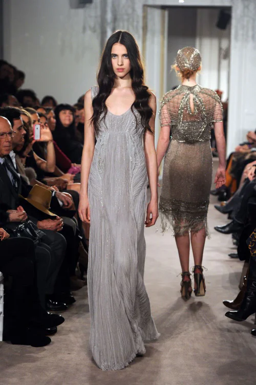 In 2012, 18-year-old Margaret Qualley walked the runway in an elegant silver-gray gown
