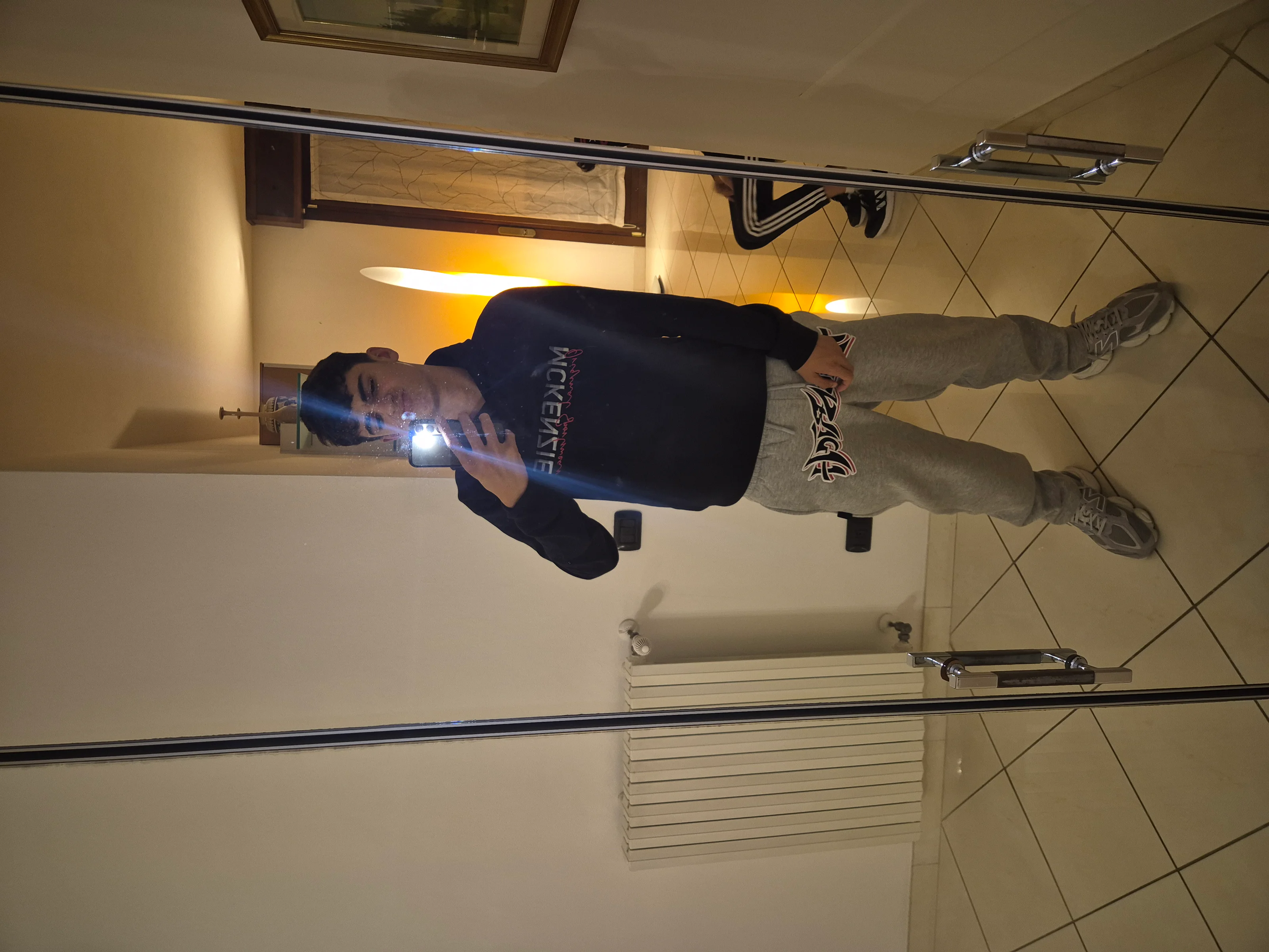 Casual Outfit with Dark Hoodie and Gray Sweatpants for Relaxed Style