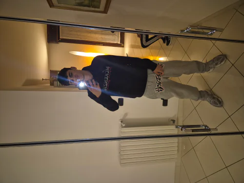 Casual Outfit with Dark Hoodie and Gray Sweatpants for Relaxed Style