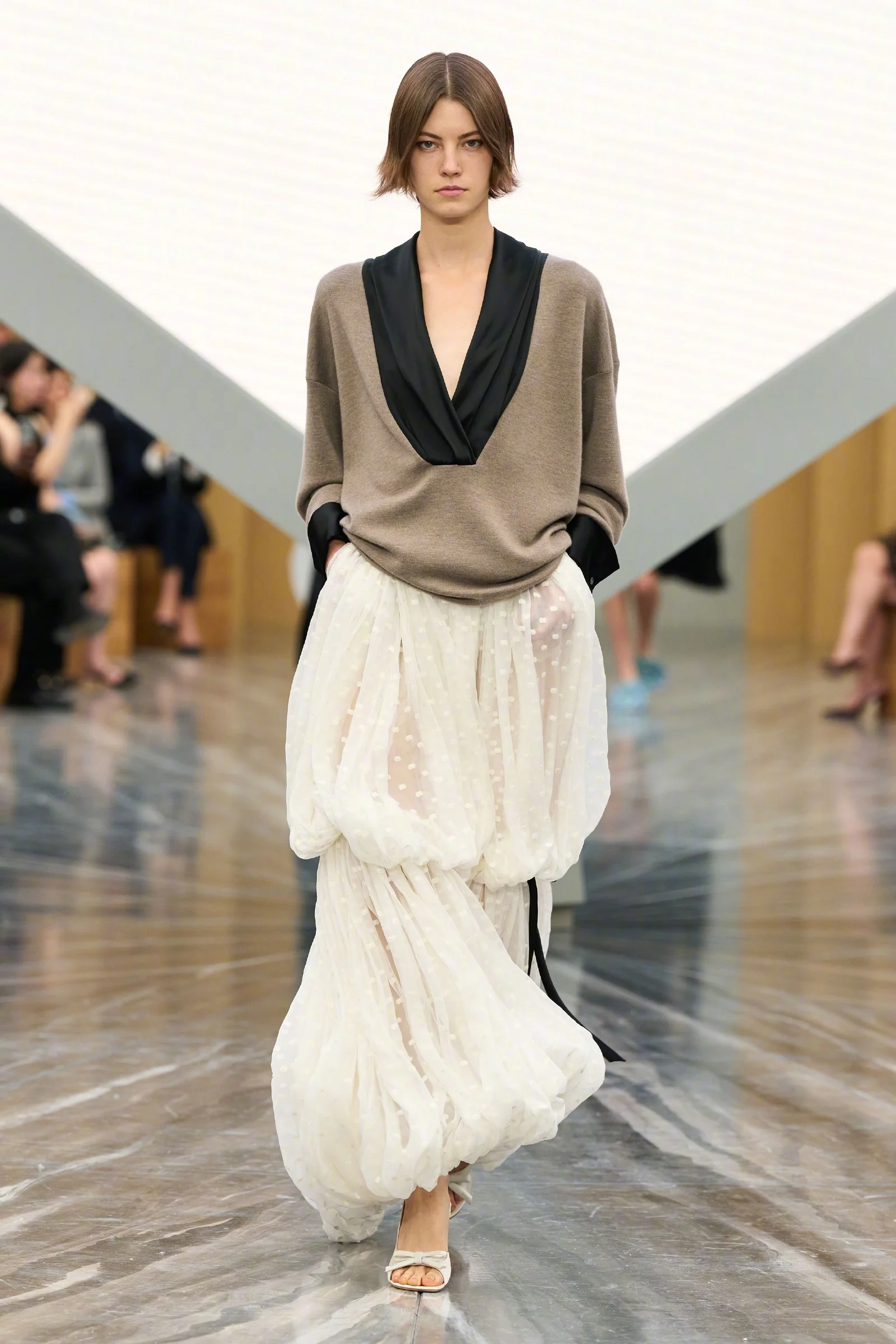 Dana Smith in Chic Knit Top and Voluminous Skirt with Delicate Details