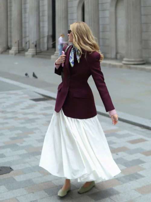 Sophisticated Burgandy Blazer Paired with Flowing White Maxi Skirt and Colorful Scarf