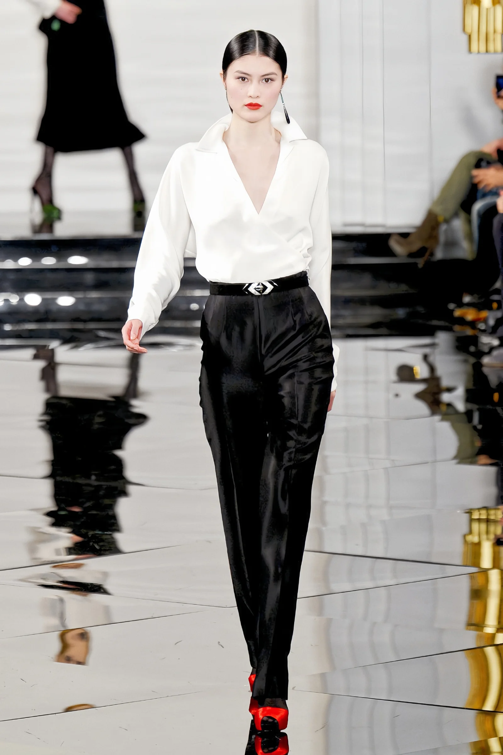Elegant Black and White Runway Look with Silk Blouse and Tailored Trousers