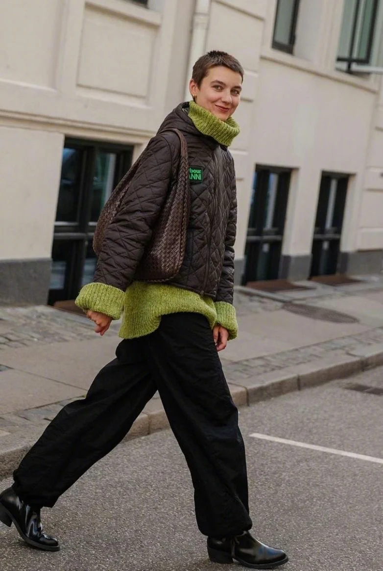 Cozy Quilted Jacket and Vibrant Green Sweater with Relaxed Black Pants