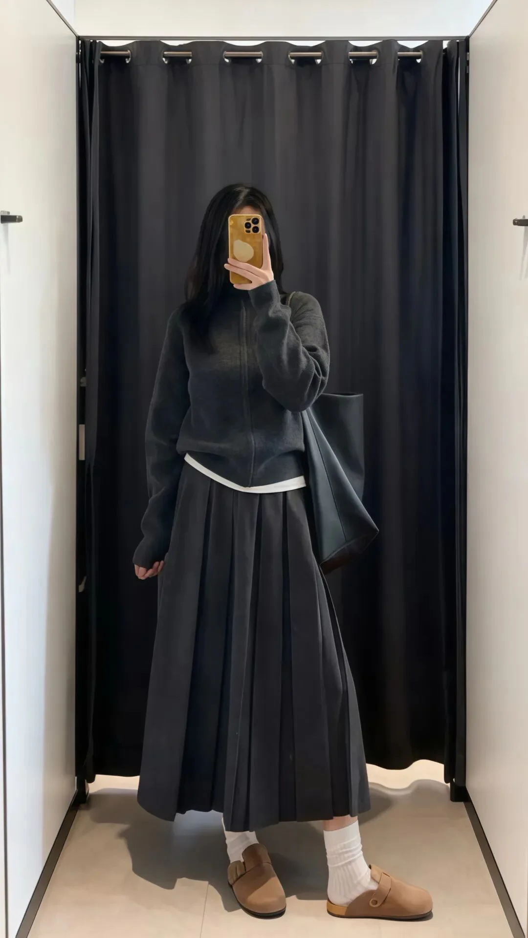 Elegant Monochrome Outfit with Pleated Skirt and Casual Accents