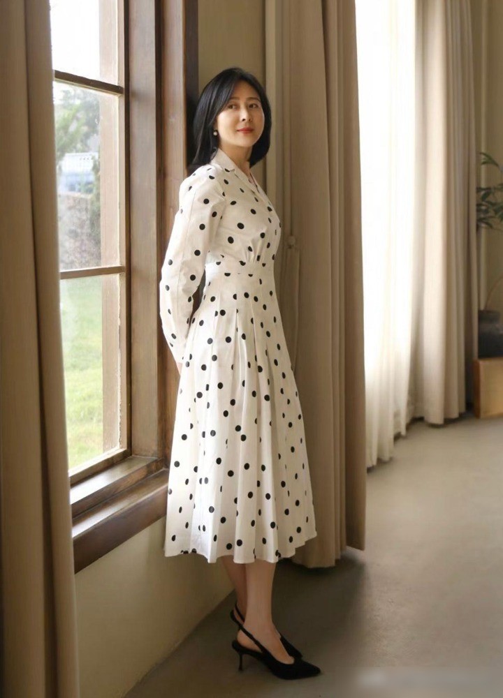 Classic spring and autumn outfit: polka dot dress