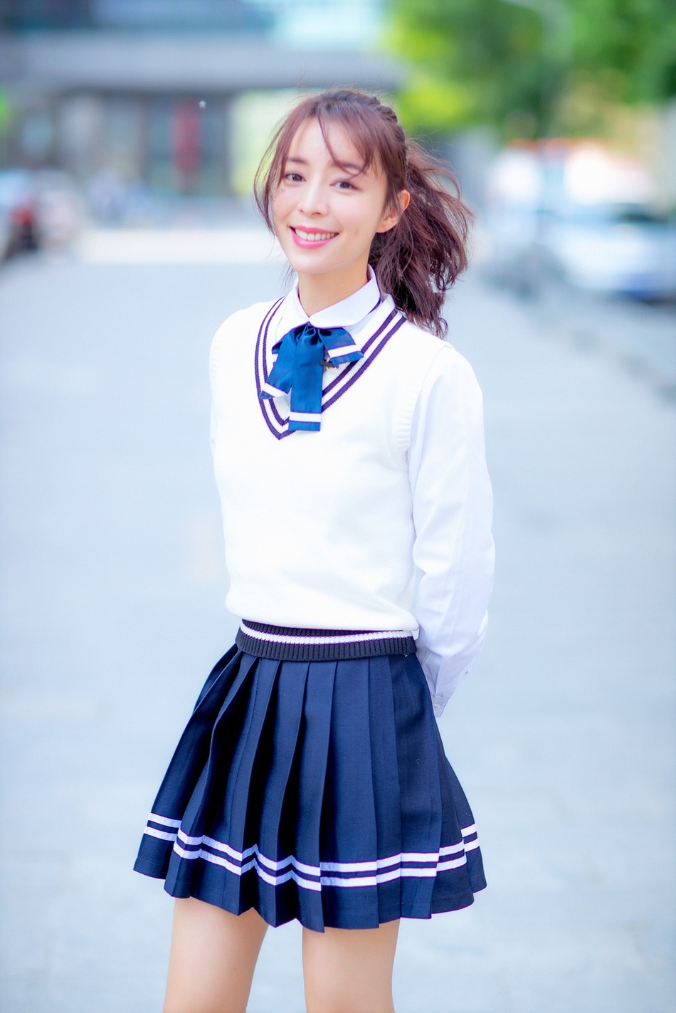 Pleated skirt with sweater vest